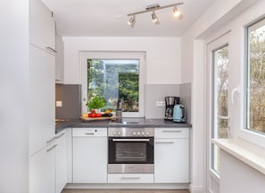 Kitchen in holiday home "Das kleine Haus"