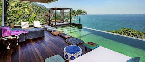 Balcony / Terrace,Pool view,Sea view,Seating area,Swimming pool