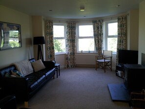 Living room overlooking park (first floor)