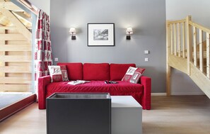 Kick back and relax on the plush sofa in the living room