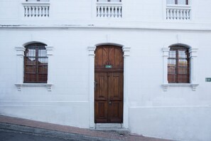 Front facade of Casa LunaLoma, with Solid wood door, main entrance 