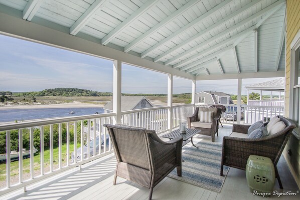 Relax on your porch and enjoy 180 degree views of the beach, ocean and sunsets