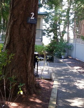 The pathway to Unit 2. Notice the "2" on the tree - to help you locate the unit!