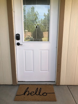 Showing the front door with self entry