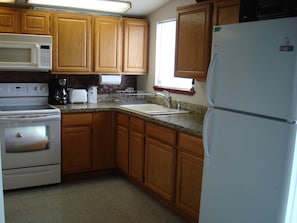 Kitchen. Photo does not show the new dishwasher. Washer/Dryer to the left.