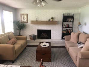 Living room with beautiful lake views and lots of natural light!