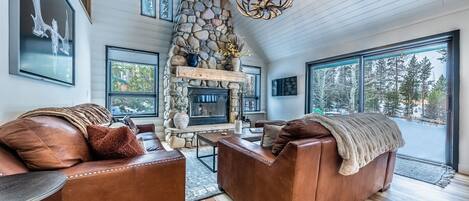 Living room - Great living room with beautiful rock chimney, with great natural light.