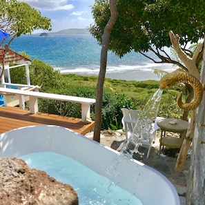 Outdoor tub perfect for relaxing & enjoying the amazing views!