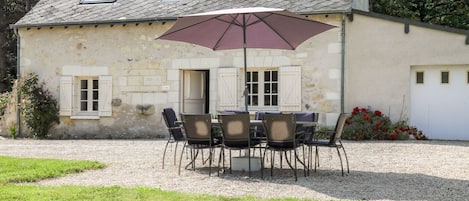 Front of the house with garden furniture. BBQ and sun loungers available