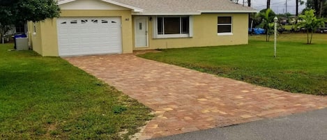 Freshly painted with updated furniture and recently paved driveway