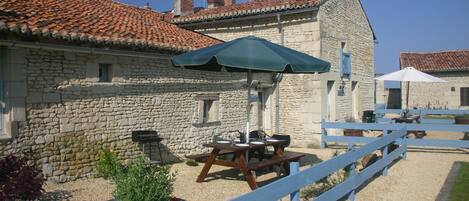 Front view of La Maison du Puits and La Vieille Maison with private terraces