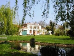 Maison, jardin, etang