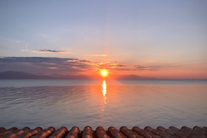 The beautiful sunrise on the corinthian gulf