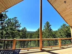 Huge covered deck and views all the way to Wyoming
