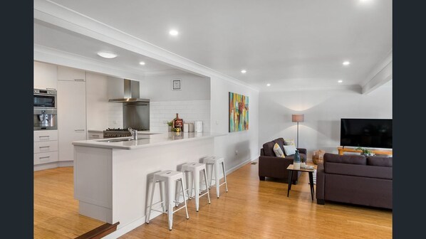 Kitchen and large open plan family room.