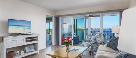 The living room includes fantastic views of the intracoastal waterway!  Smart TV including cable with WiFi throughout.