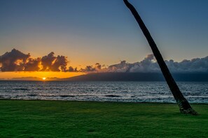 Enjoy ocean views with Molokai and Lanai just off the manicured grassy lawn