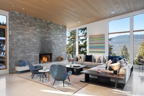 Gather around this marvelous stone fireplace with cozy seating