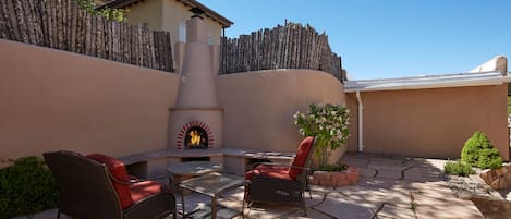 outdoor patio and kiva fireplace