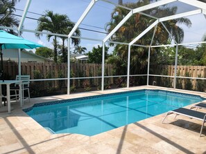 New pool with travertine pavers though out, fully screen
