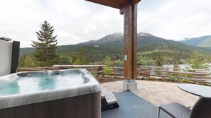 Private hot tub with mountain views