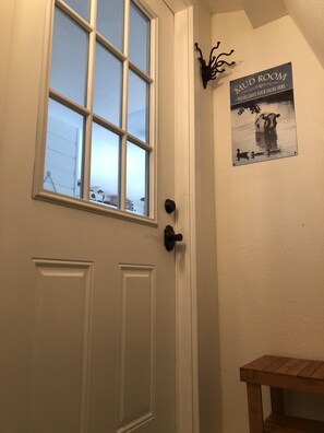 Bench at top of stairs to remove muddy shoes