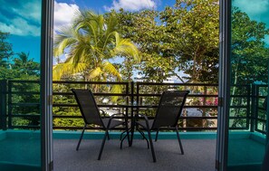 Private balcony with partial ocean views