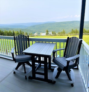 Enjoy the new 7'x7' galvanized steel deck with seating for two!