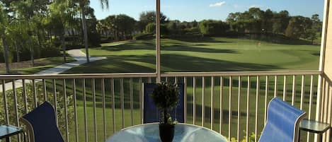 gorgeous lanai view of 8th green and lake