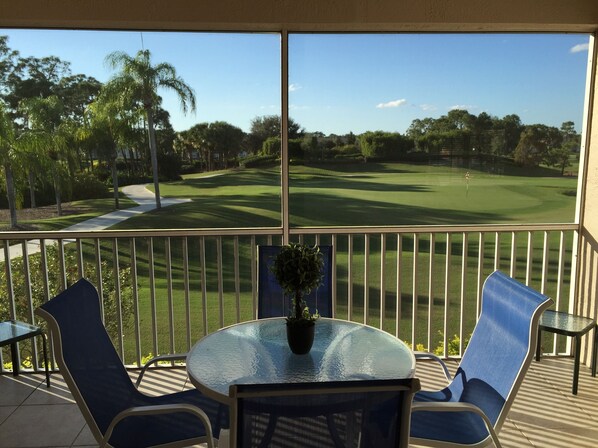 gorgeous lanai view of 8th green and lake