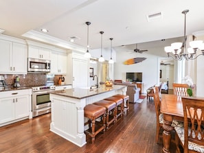 Granite counters, high end finishings, hardwood floors, and open concept!