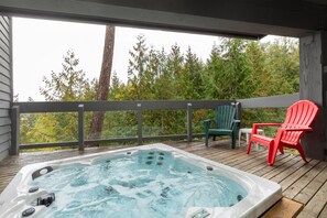 Sunken private hot tub on the lower balcony