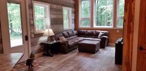 Great Room with large windows and microfiber couch