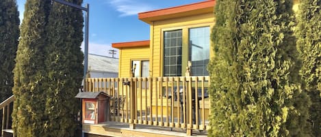 Large outdoor social area on this iconic Candy Store made cabin conversion.