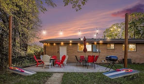 Bask in the fresh Colorado air in your private backyard oasis, outfitted with string lights, a new fire table, Adirondack seats, dining set, charcoal grill and yard games!