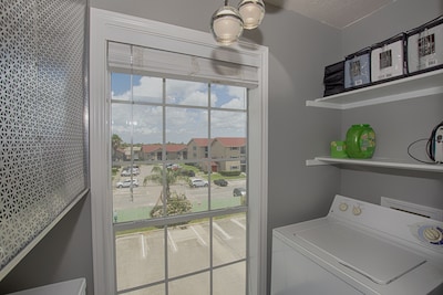 Galveston meets Key West in this Beach Condo...Steps to Galveston Beach and Bay!
