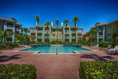 Galveston meets Key West in this Beach Condo...Steps to Galveston Beach and Bay!