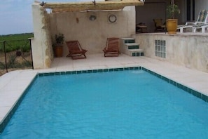 Comfortable area by the swimming pool