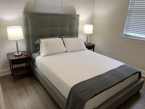 Queen upholstered bed with 12" memory foam mattress