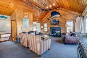 Top-Level Living Room with Deck Access