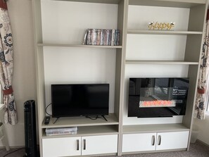 Cosy fire and TV in lounge area