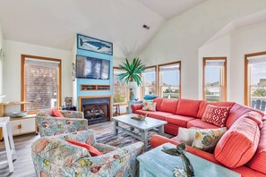 Top-Level Living Room with Deck Access