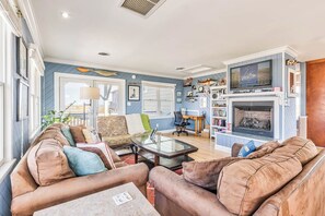 Top-Level Living Room with Deck Access