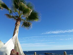 What a life to enjoy, relax and day dream listening to the waves.