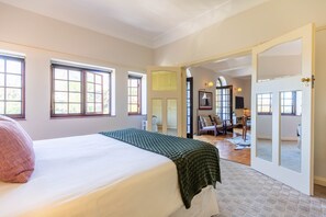 bedroom facing Living room and French doors 
