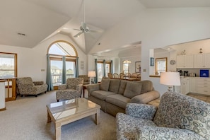 Top-Level Living Room with Deck Access