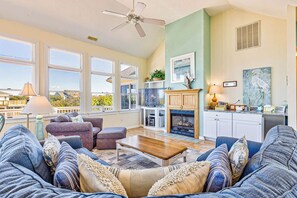 Top-Level Living Room with Deck Access