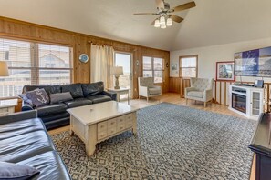 Top-Level Living Room with Deck Access