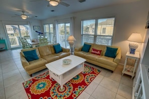 Top-Level Living Room with Deck Access