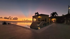 Beautiful ocean sunsets from the villa and pool 